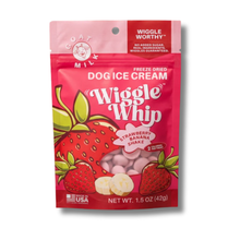 Load image into Gallery viewer, A stand-up pouch of Goat Milk Wiggle Whip Strawberry Banana Shake freeze dried dog ice cream, featuring a bright pink and red design with illustrations of strawberries and banana ice cream pieces.