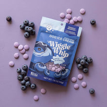 Load image into Gallery viewer, Dog ice cream package with blueberries and pink treats on a pink background