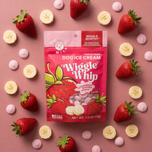Load image into Gallery viewer, Dog ice cream package 'Wiggle Whip' with strawberries, bananas, and pink cookies on a pink background