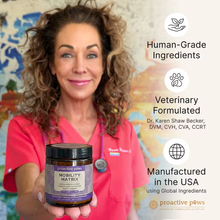 Load image into Gallery viewer, Dr. Karen Becker holding a jar of 'proactive paws' with product features listed on the right.