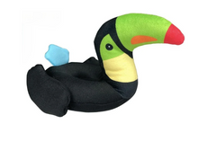 Load image into Gallery viewer, A plush toy shaped like a toucan, featuring a black body, a bright green head, a yellow under-face, a red beak tip, and small blue wings, shown on a plain white background.