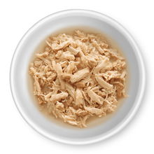 Load image into Gallery viewer, RAWZ shredded chicken &amp; duck cat food, light brown chicken in a pale broth, presented in a white oval bowl against a clean white background.