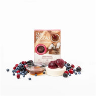Individual frozen berry and yogurt dog treat medallions in a serving dish.