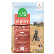 A bag of Open Farm Grain-Free Puppy Salmon and Sweet Potato dry dog food featuring wild-caught salmon and non-GMO vegetables.